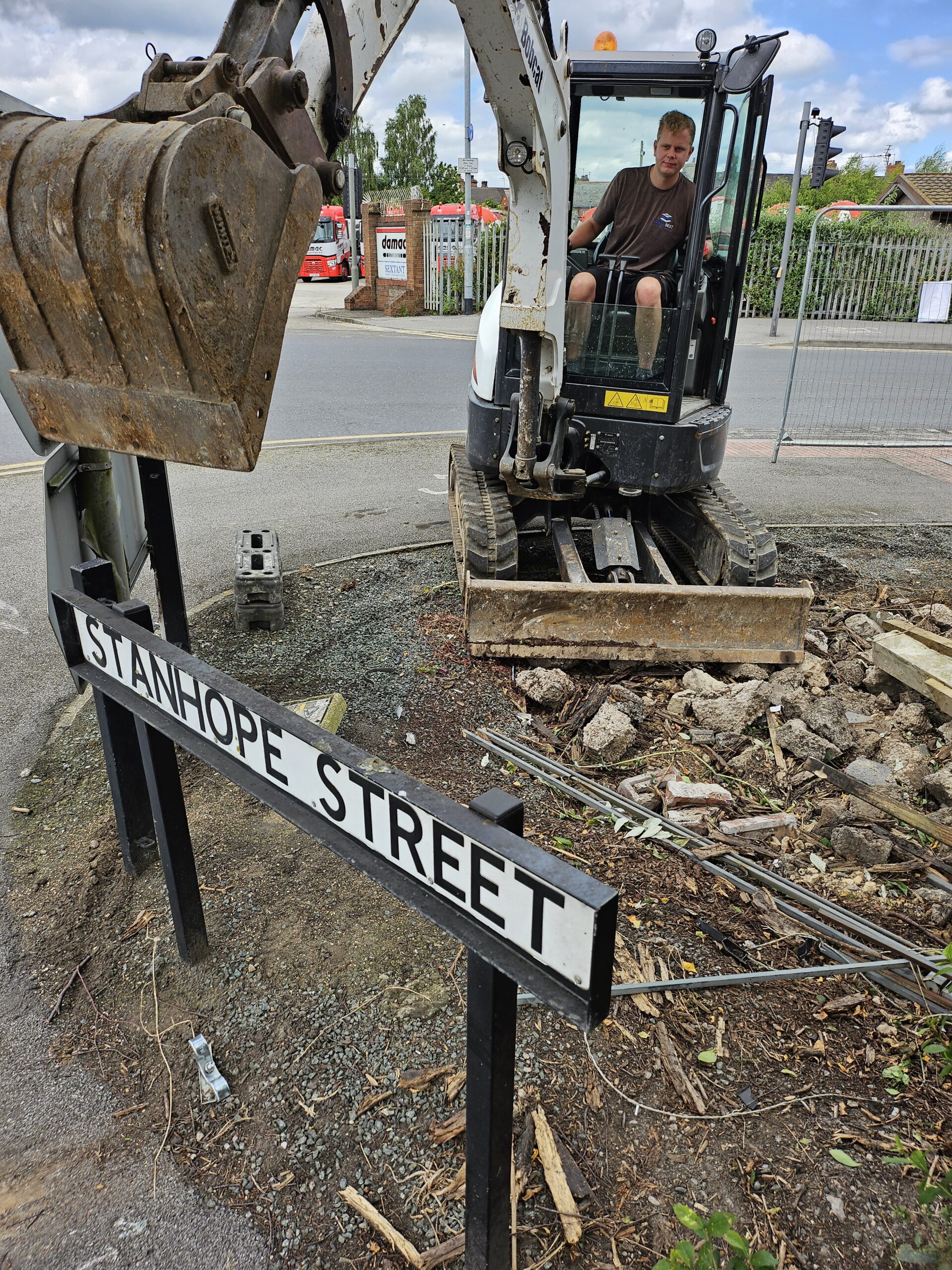 Sam Wilcox digger skills to remove unwanted obstructions at Hartleys