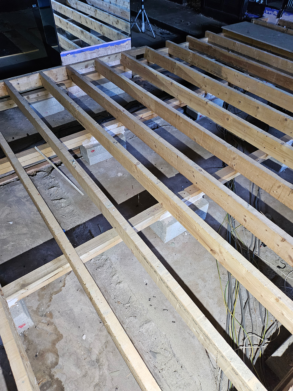 Timber floor joists removed by Saddle & Glass for a new storage facility